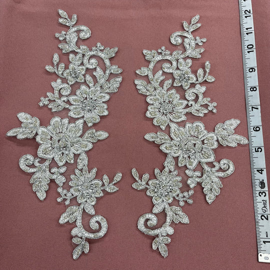 Beaded & Corded Silver Floral Appliqué Lace Embroidered on 100% Polyester Organza or Net Mesh. This can be applied to Theatrical dance ballroom costumes, bridal dresses, bridal headbands endless possibilities. Sold By Pair. Lace Usa