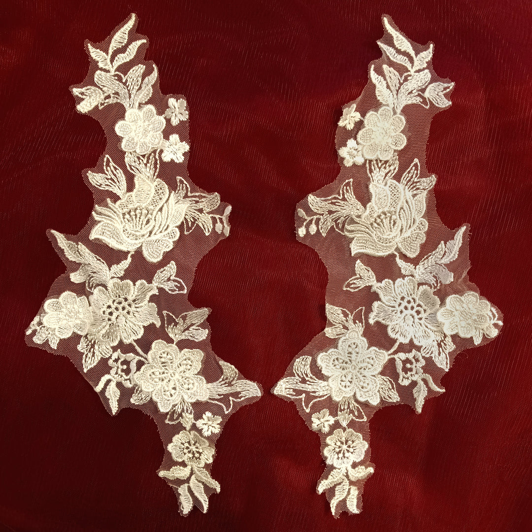 Embroidered Ivory Applique with 3D Flowers on 100% Polyester Net Mesh.