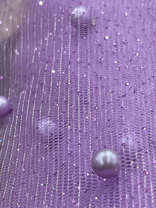 Glitter Mesh Net With Scattered Pearl , 2-Way Stretch, sold by the yard. 100% Polyester 60" wide. This mesh fabric is a 2-way stretch on the width. Pearls are scattered across the mesh.  Sold by the yard, 1-quantity equals to 1-yard.  If you order more than 1-yard, it will be ship in one continuous length.    Lace Usa