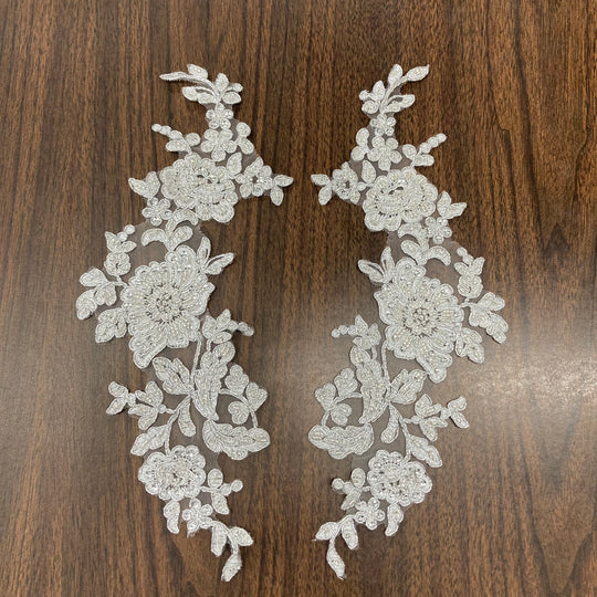 Beaded & Corded Floral Appliqué Lace Embroidered on 100% Polyester Organza or Net Mesh. This can be applied to Theatrical dance ballroom costumes, bridal dresses, bridal headbands endless possibilities.  Sold By Pair.  Lace Usa